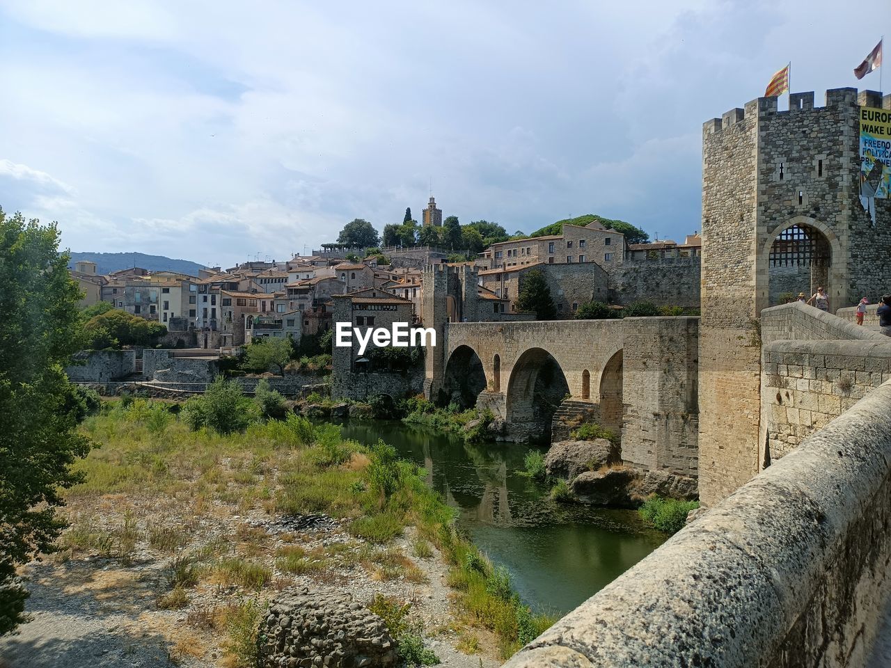 Beautiful side view off a city in spain with bridge and tower