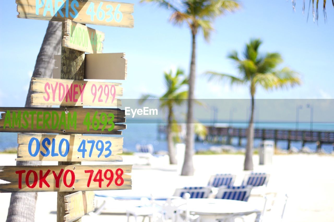 View of sign board on beach