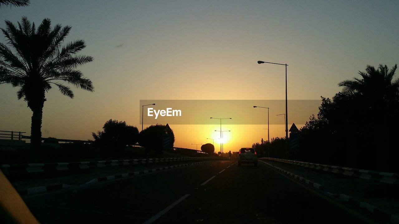 VIEW OF ROAD AT SUNSET