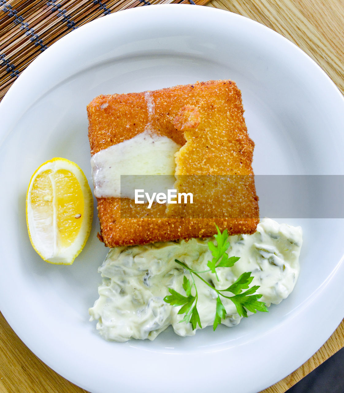 CLOSE-UP OF FOOD SERVED ON TABLE