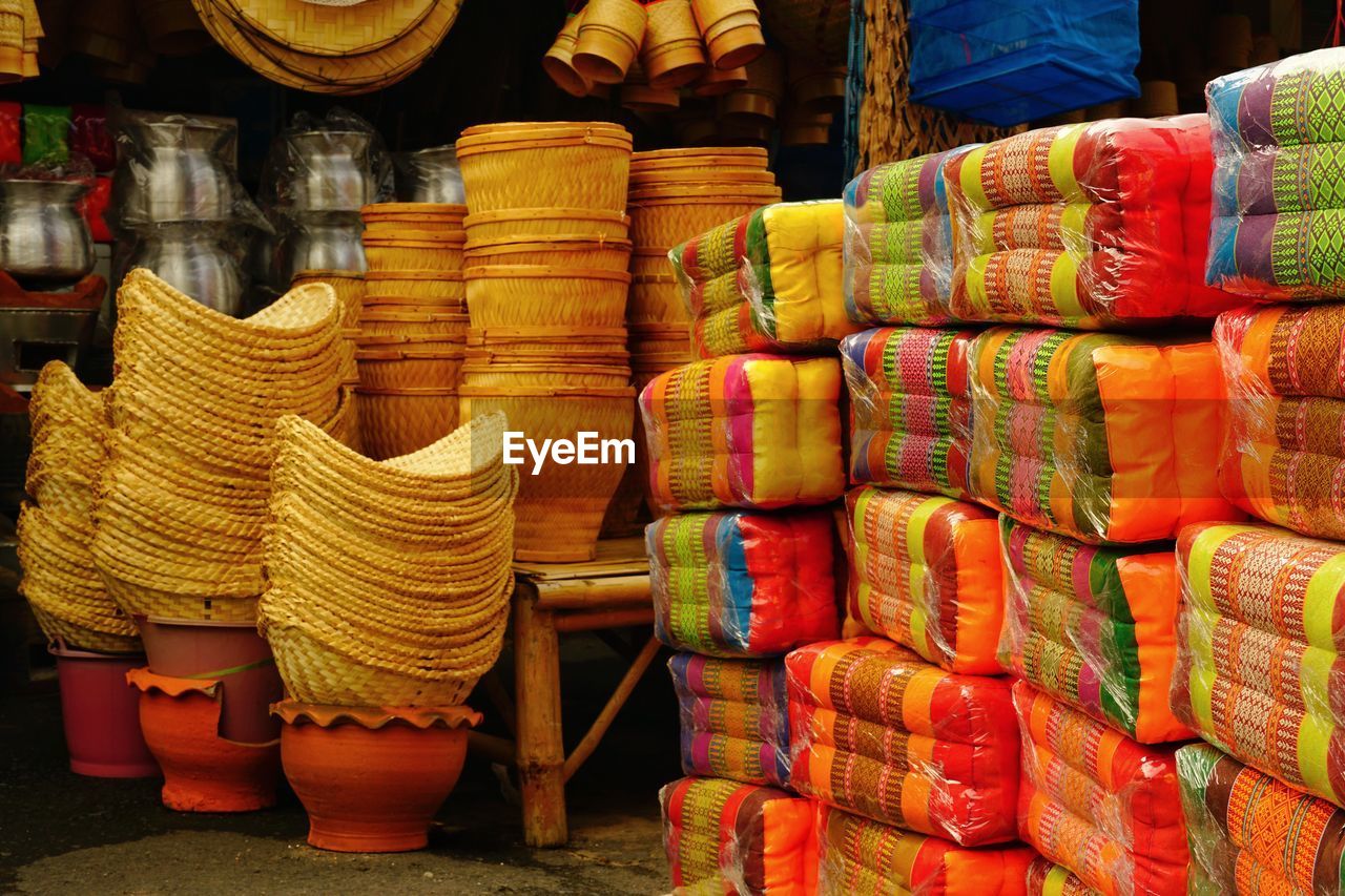 Stack of multi colored for sale at market stall