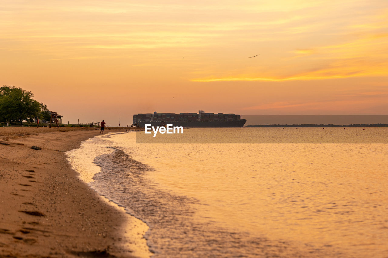 Big container ship crossing the chesapeake bay, view from sandy point state park 