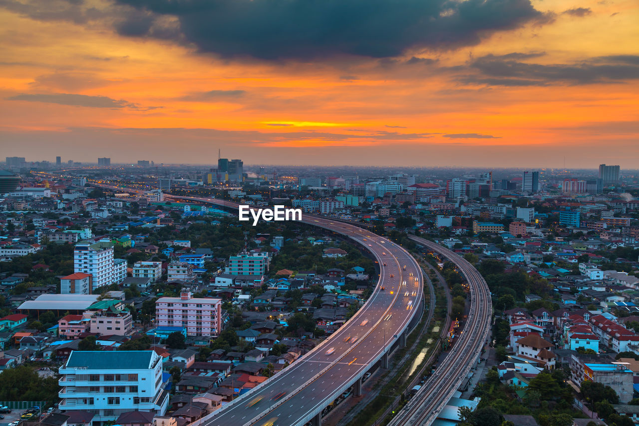 High angle view of cityscape against sky during sunset