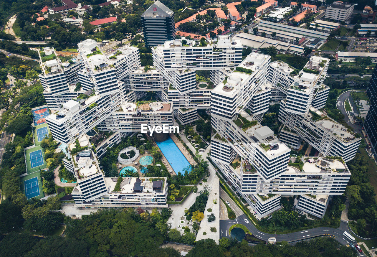 HIGH ANGLE VIEW OF TREES AND BUILDINGS