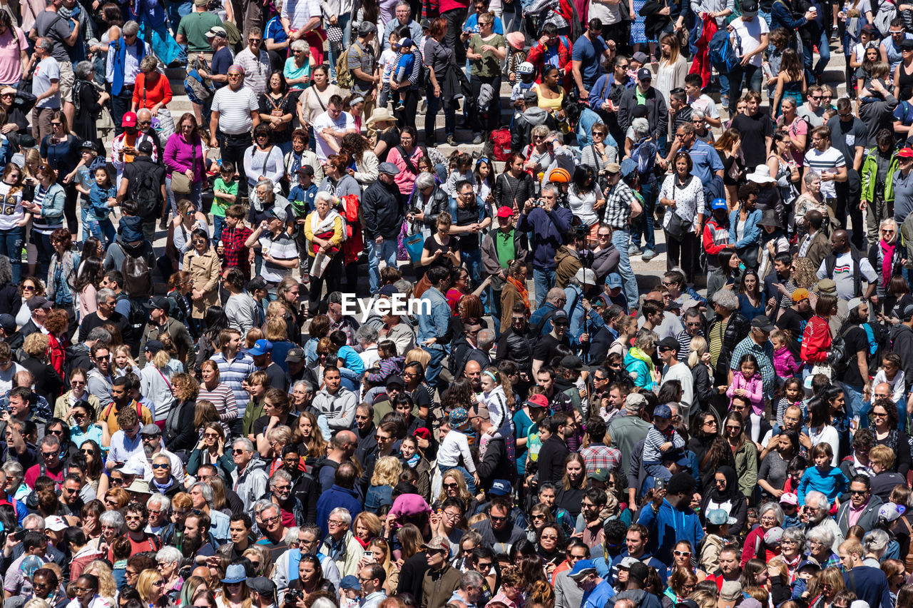 High angle view of group of people in the street