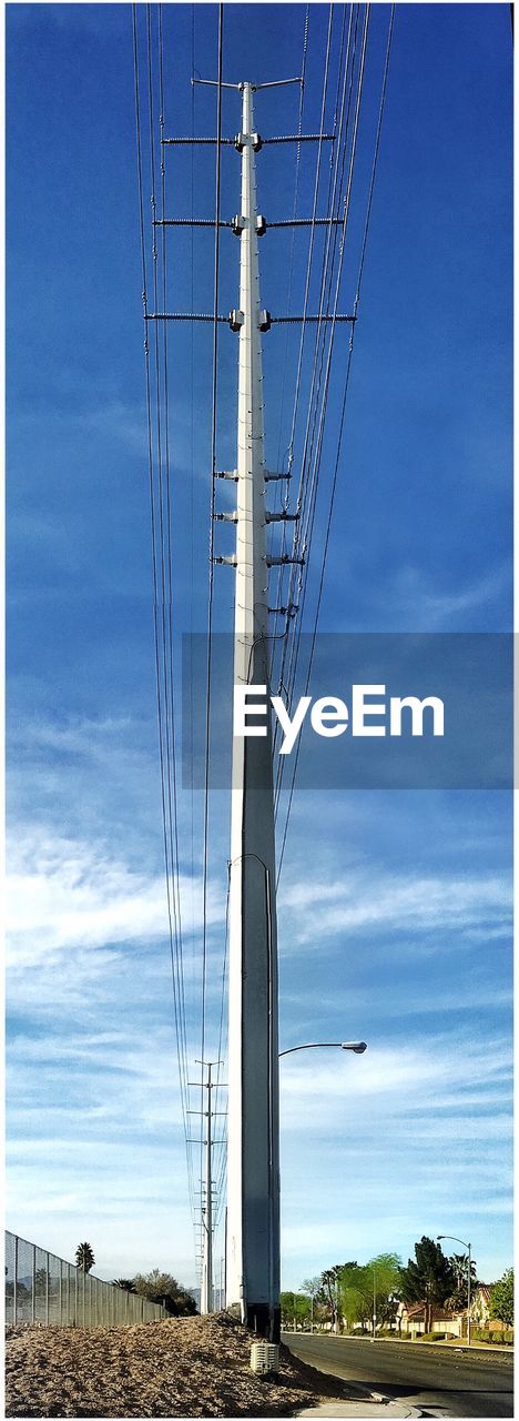 VIEW OF RAILWAY BRIDGE AGAINST BLUE SKY