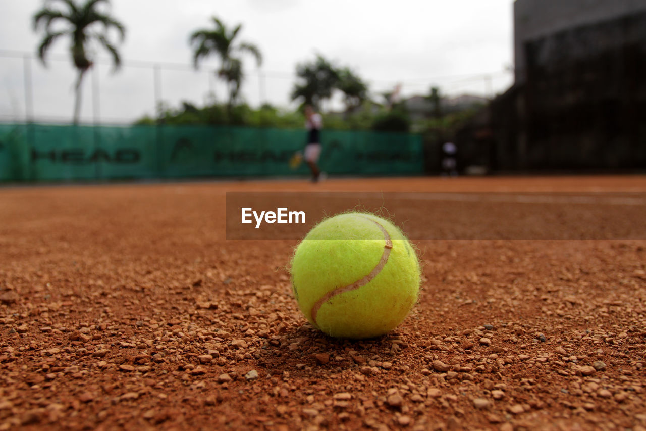 Close-up of yellow ball on field