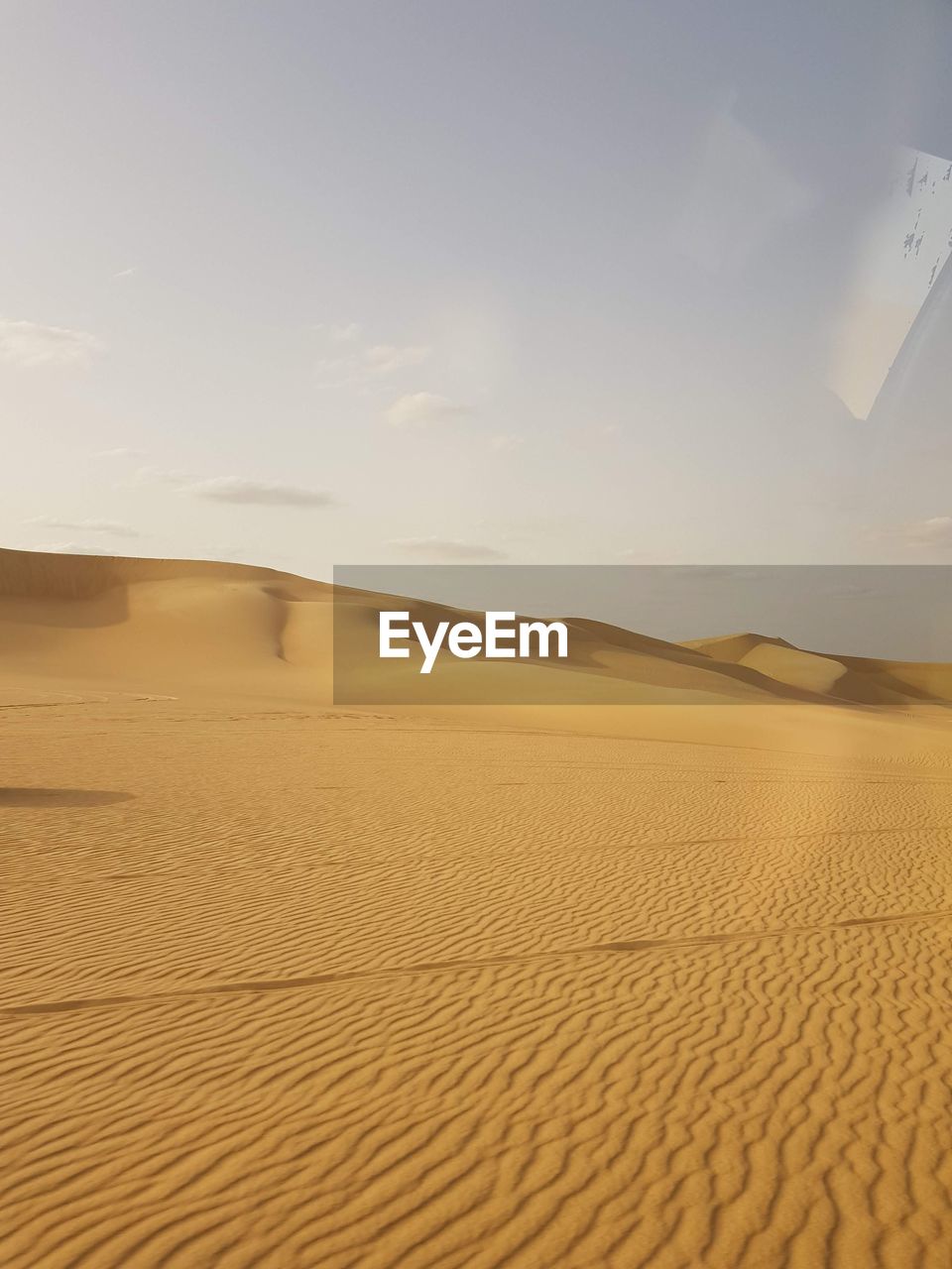 Scenic view of desert against sky