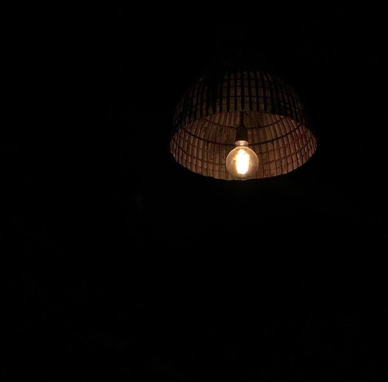 CLOSE-UP OF ILLUMINATED ELECTRIC LAMP