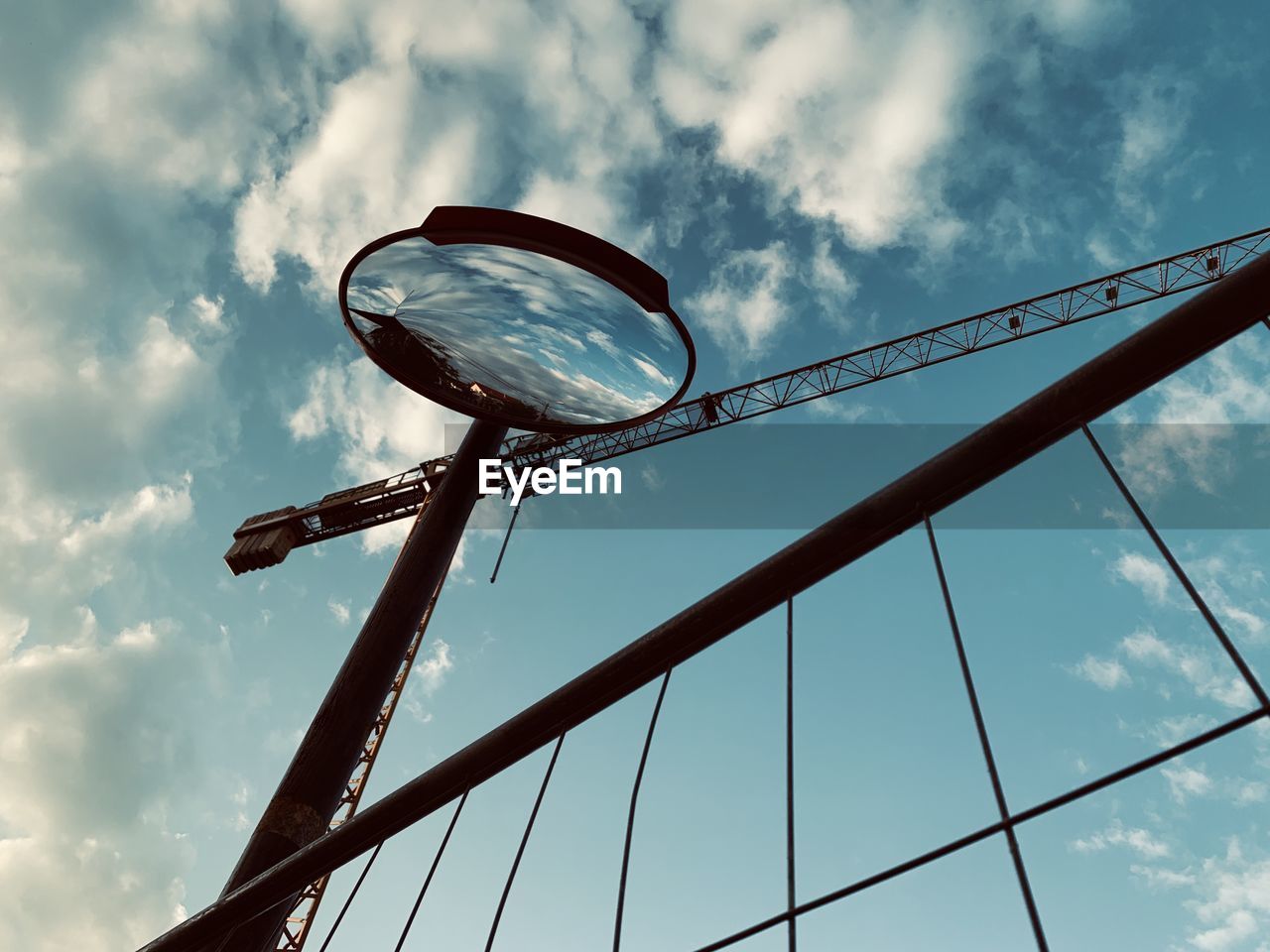 LOW ANGLE VIEW OF BASKETBALL COURT AGAINST SKY