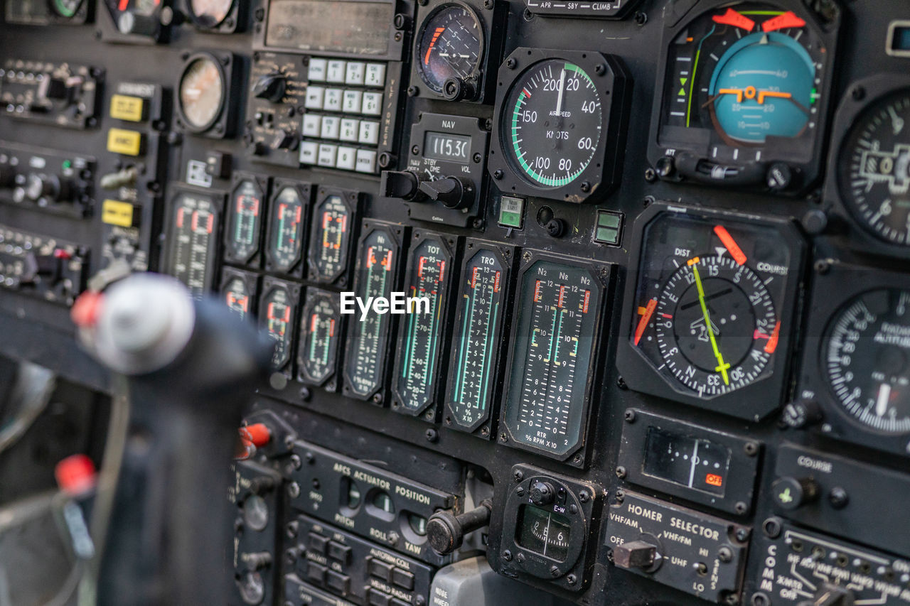 CLOSE-UP OF AIRPLANE SEEN THROUGH GLASS