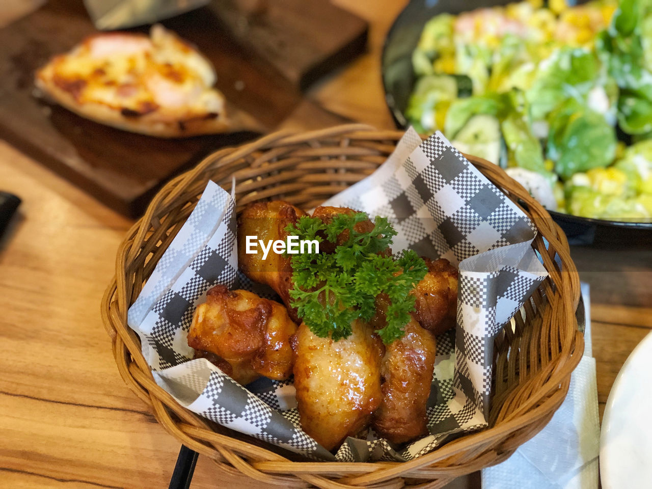 High angle view of food in basket on table