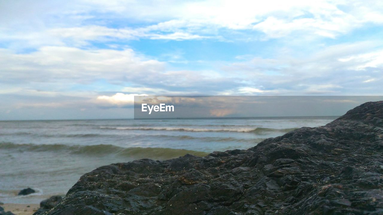 SCENIC VIEW OF SEA AND BEACH