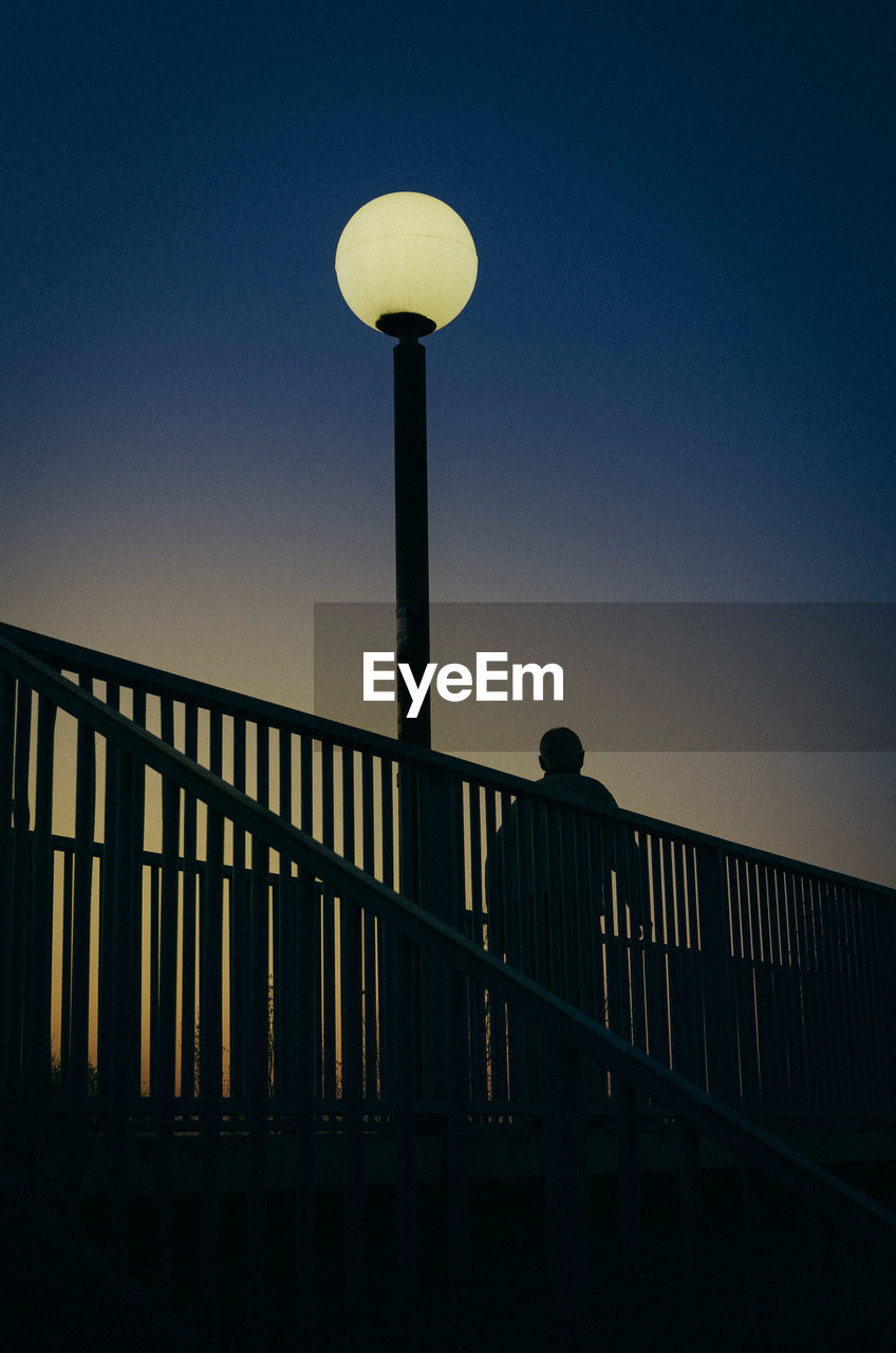 Low angle view of street light against clear sky