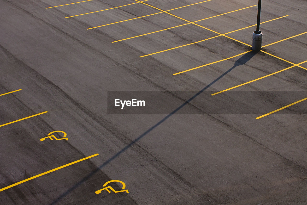 High angle view of disability signs on road