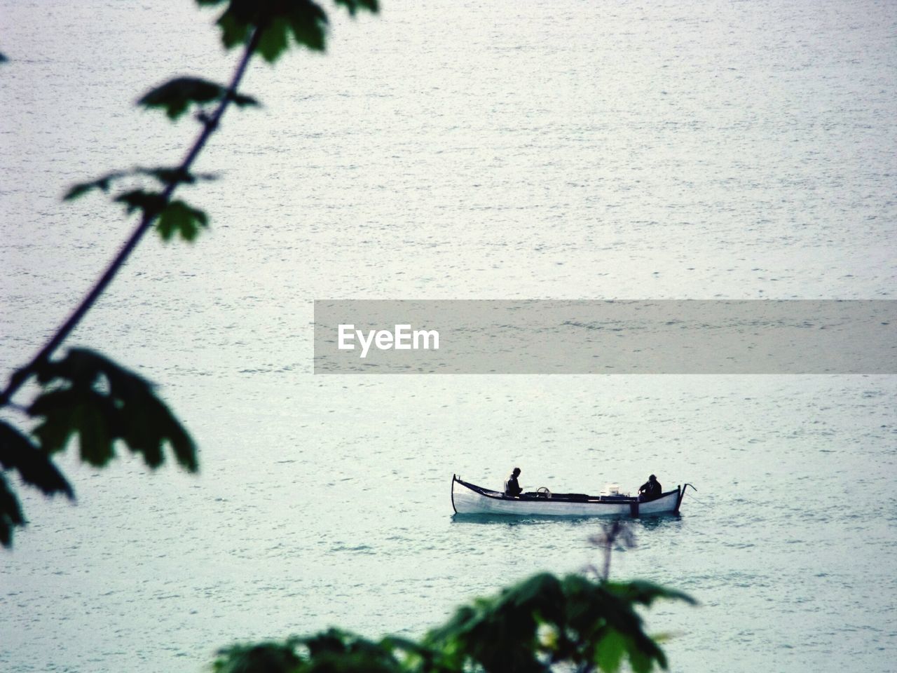 Side view of lone boat in calm sea