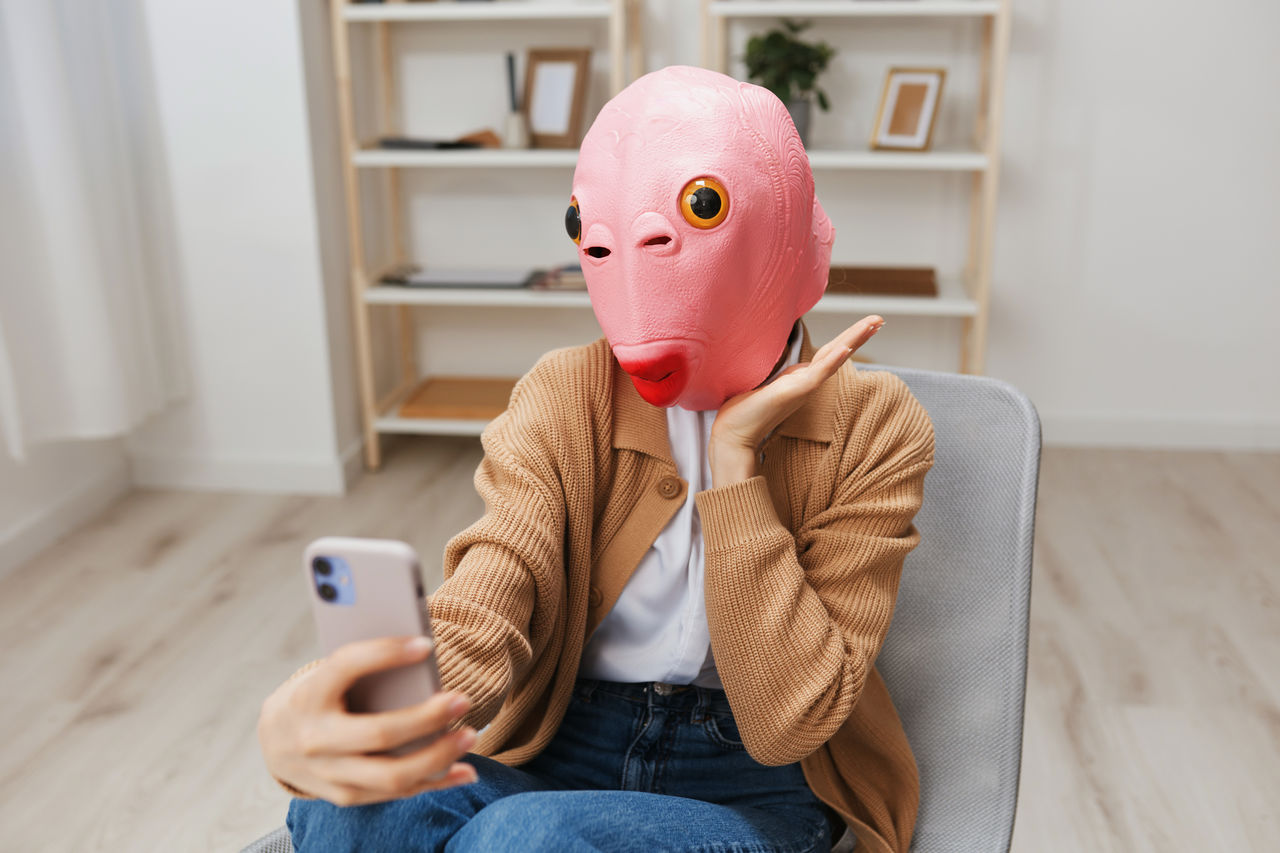 rear view of woman with stuffed toy