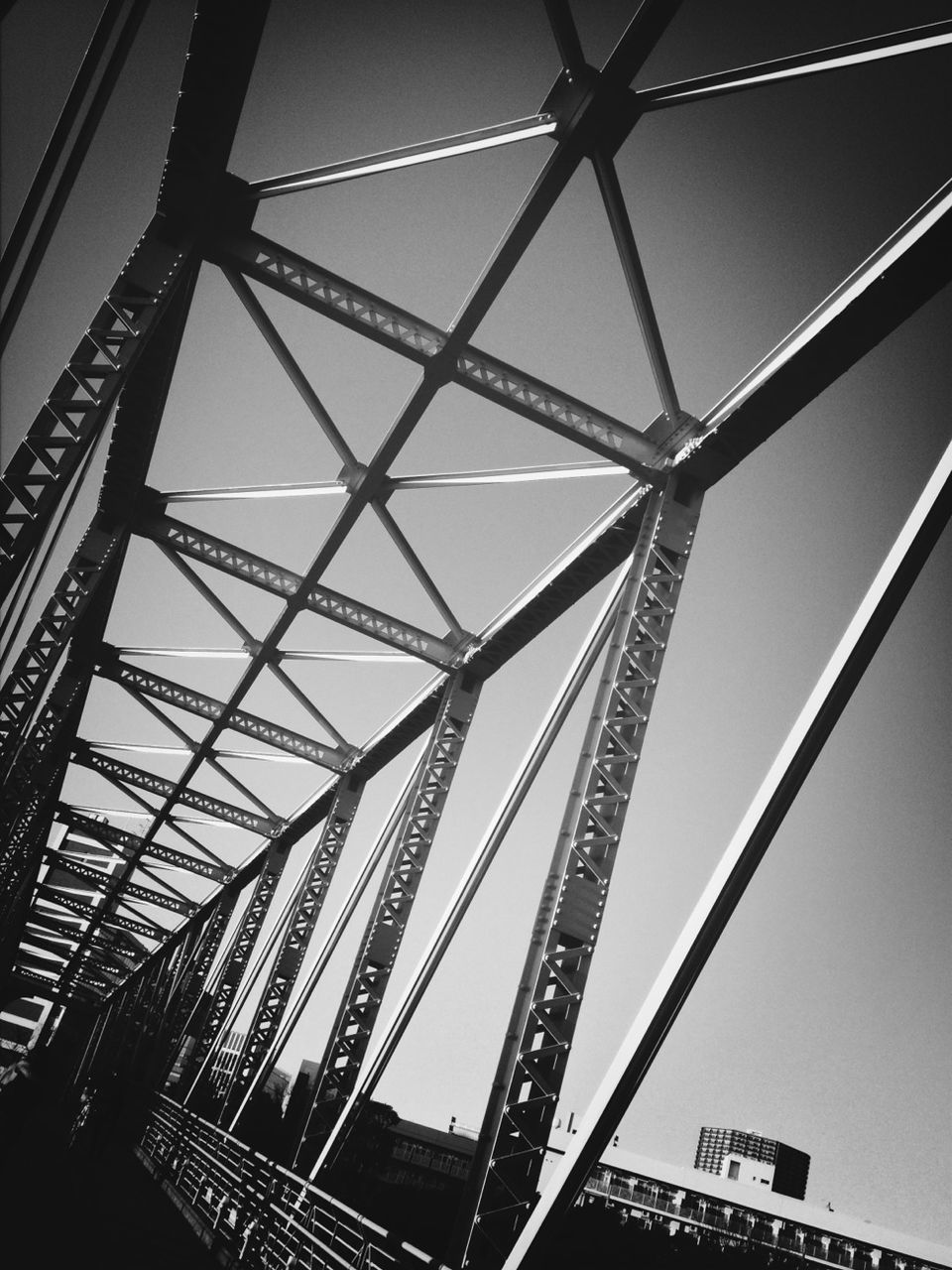 Low-angle view of steel footbridge