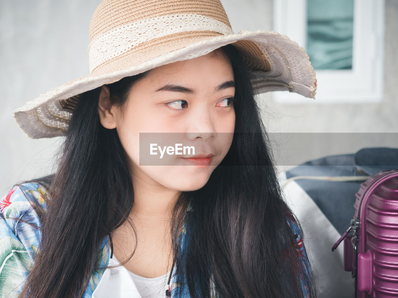 Travel concept from young asian woman in summer clothes smiling cheerful and happy.