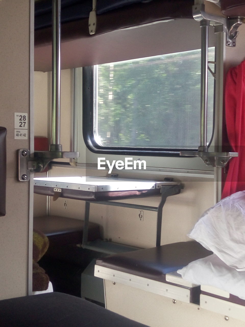 CLOSE-UP OF TRAIN IN BUS