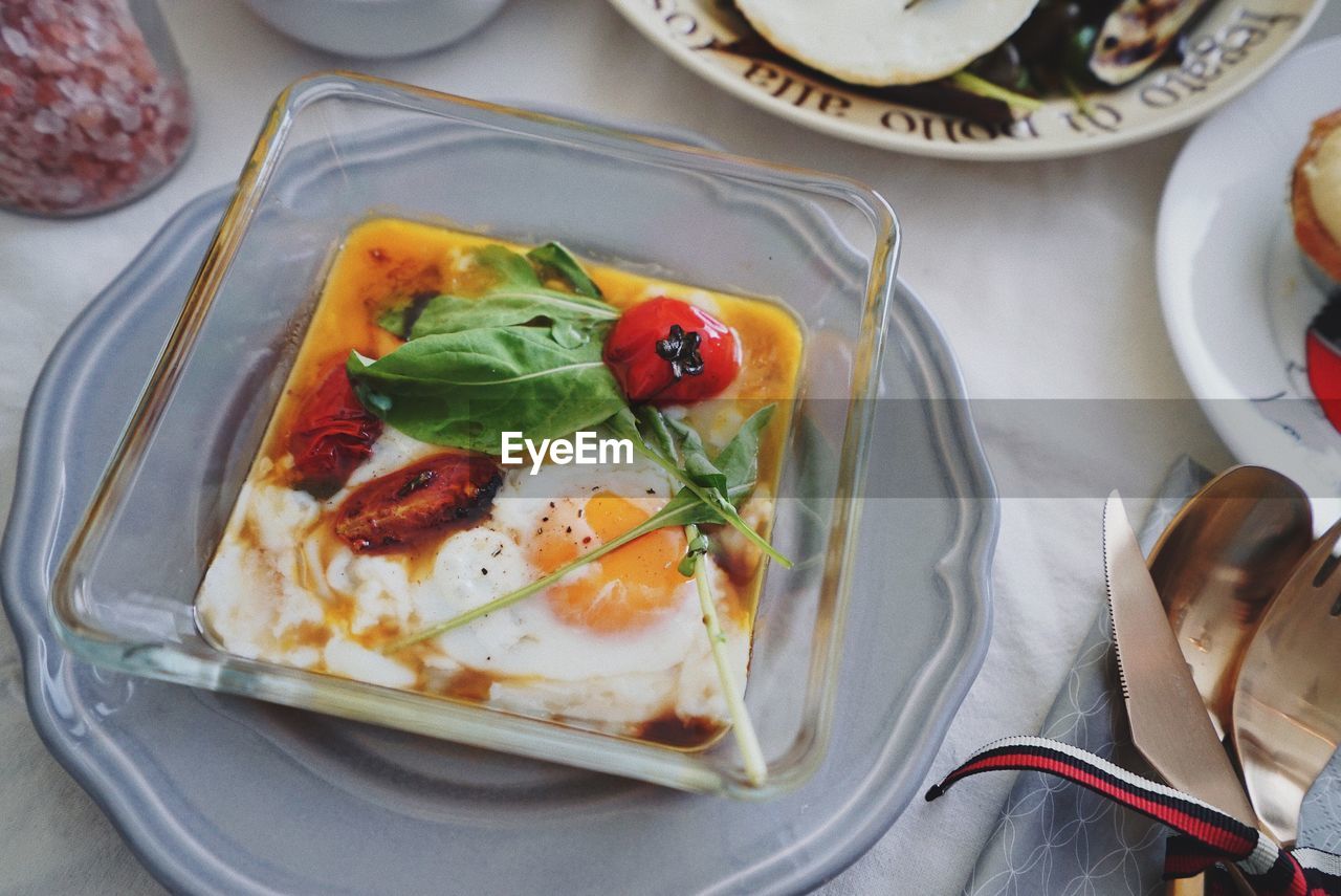 CLOSE-UP OF BREAKFAST SERVED ON TABLE