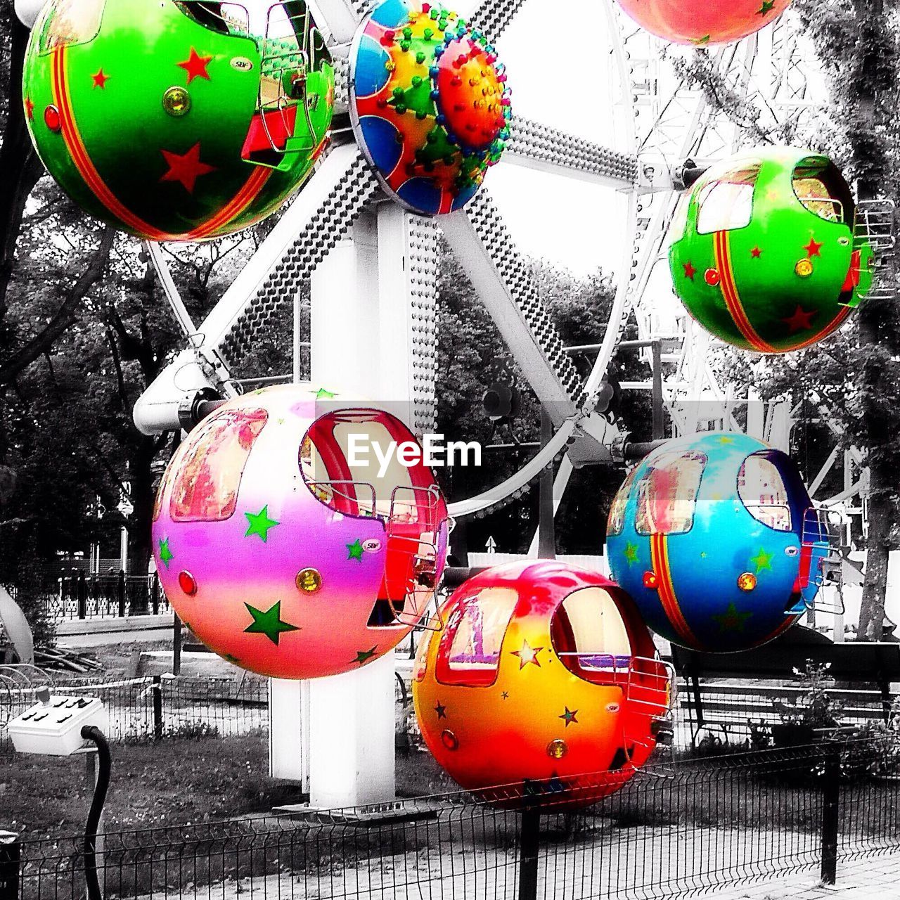 LOW ANGLE VIEW OF COLORFUL BALLOONS ON RED BALLOONS