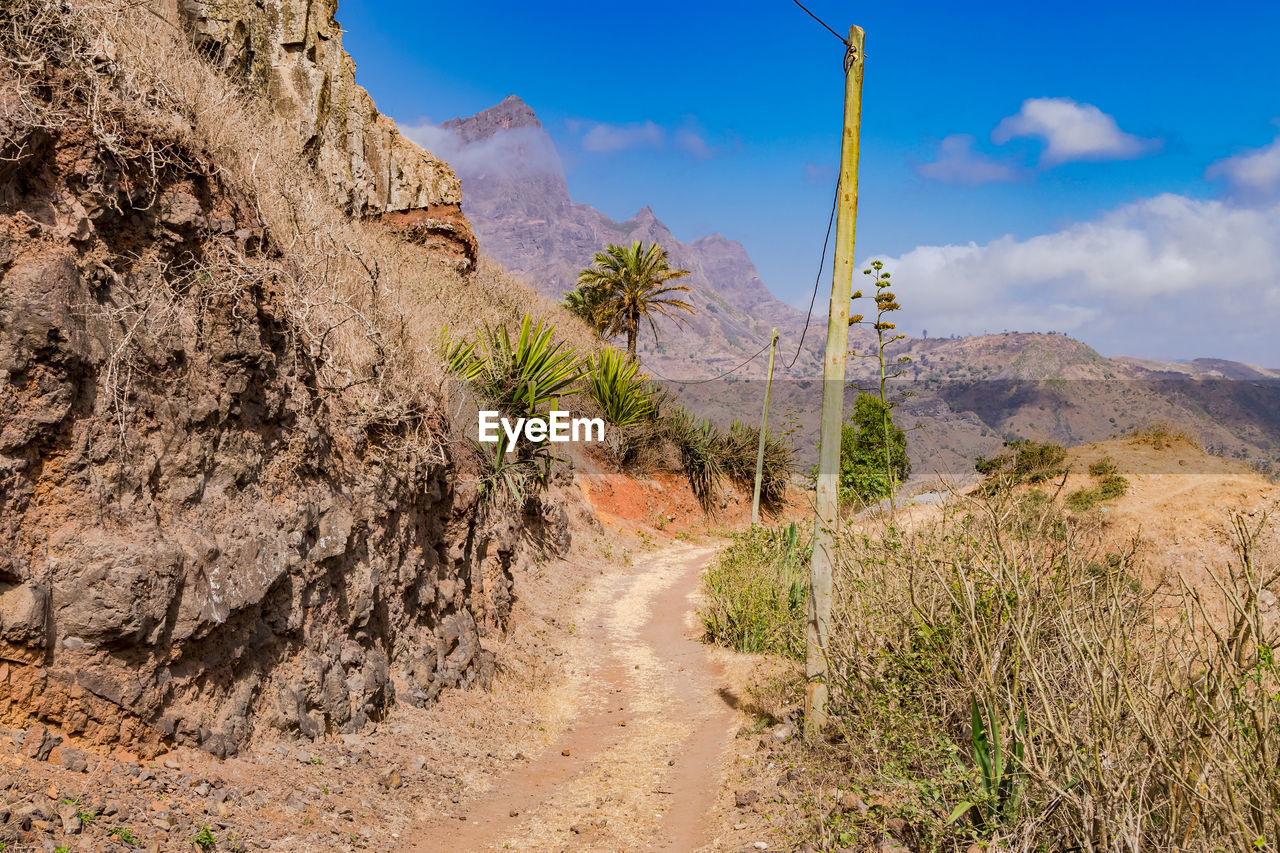 Hiking trail through the steppe in the mountains of santiago island, cabo verde, africa