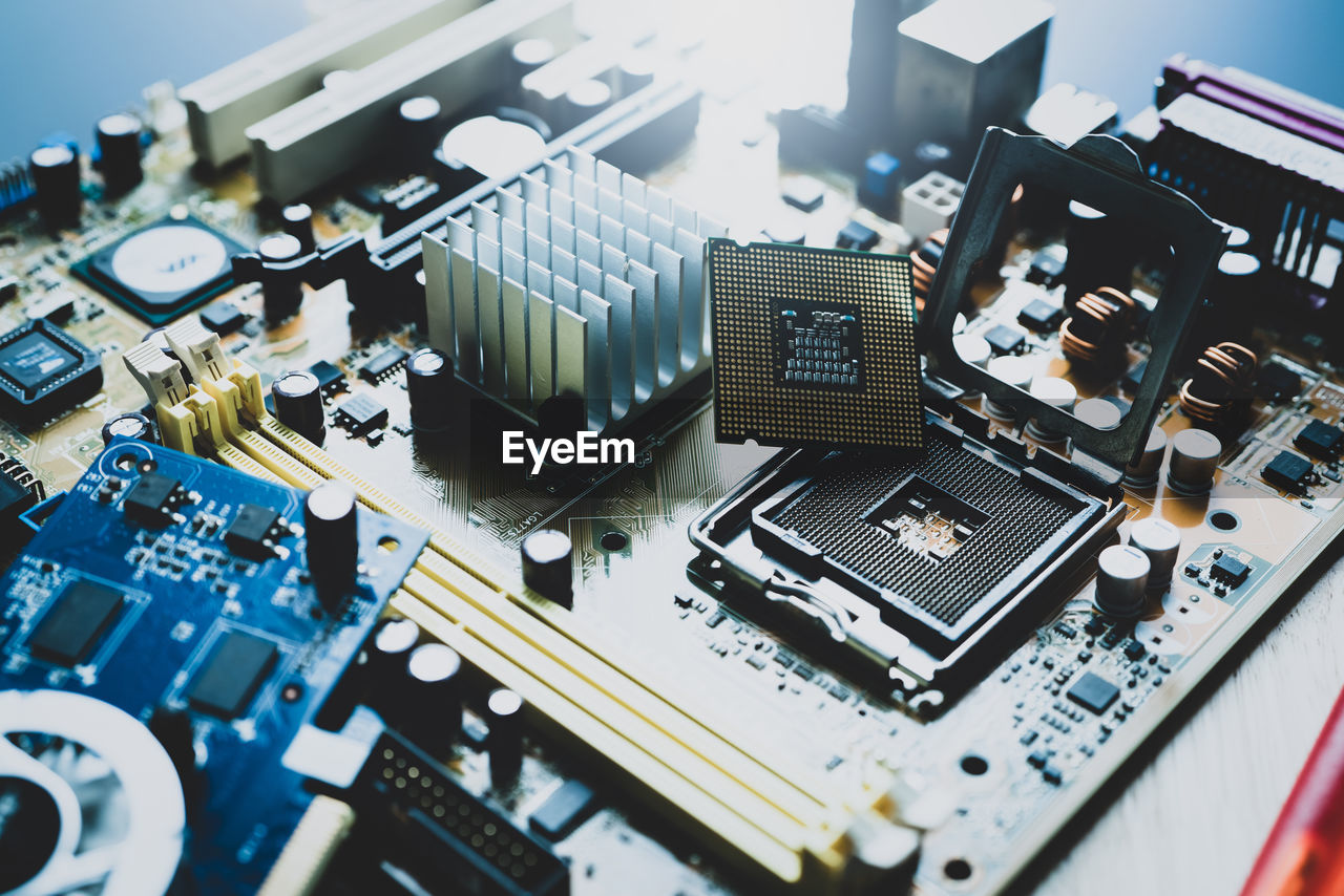 Selective focus computer chip on socket. chipset on electronic circuit board of pc motherboard