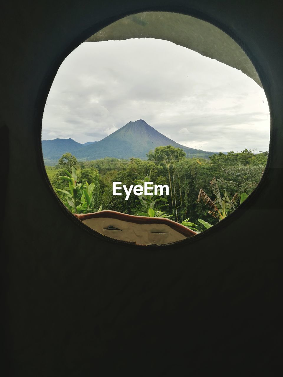 LANDSCAPE SEEN THROUGH CAR WINDOW