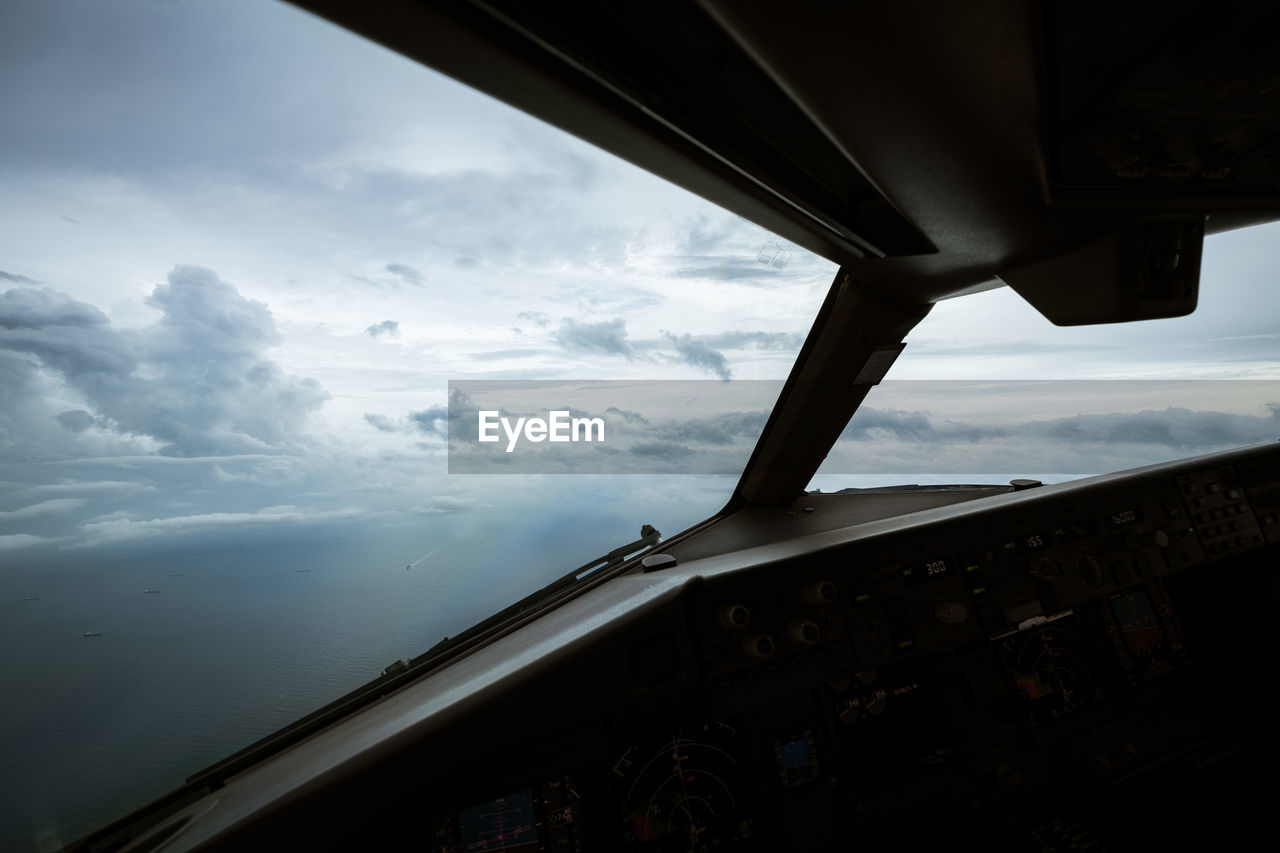 LOW ANGLE VIEW OF AIRPLANE WINDOW