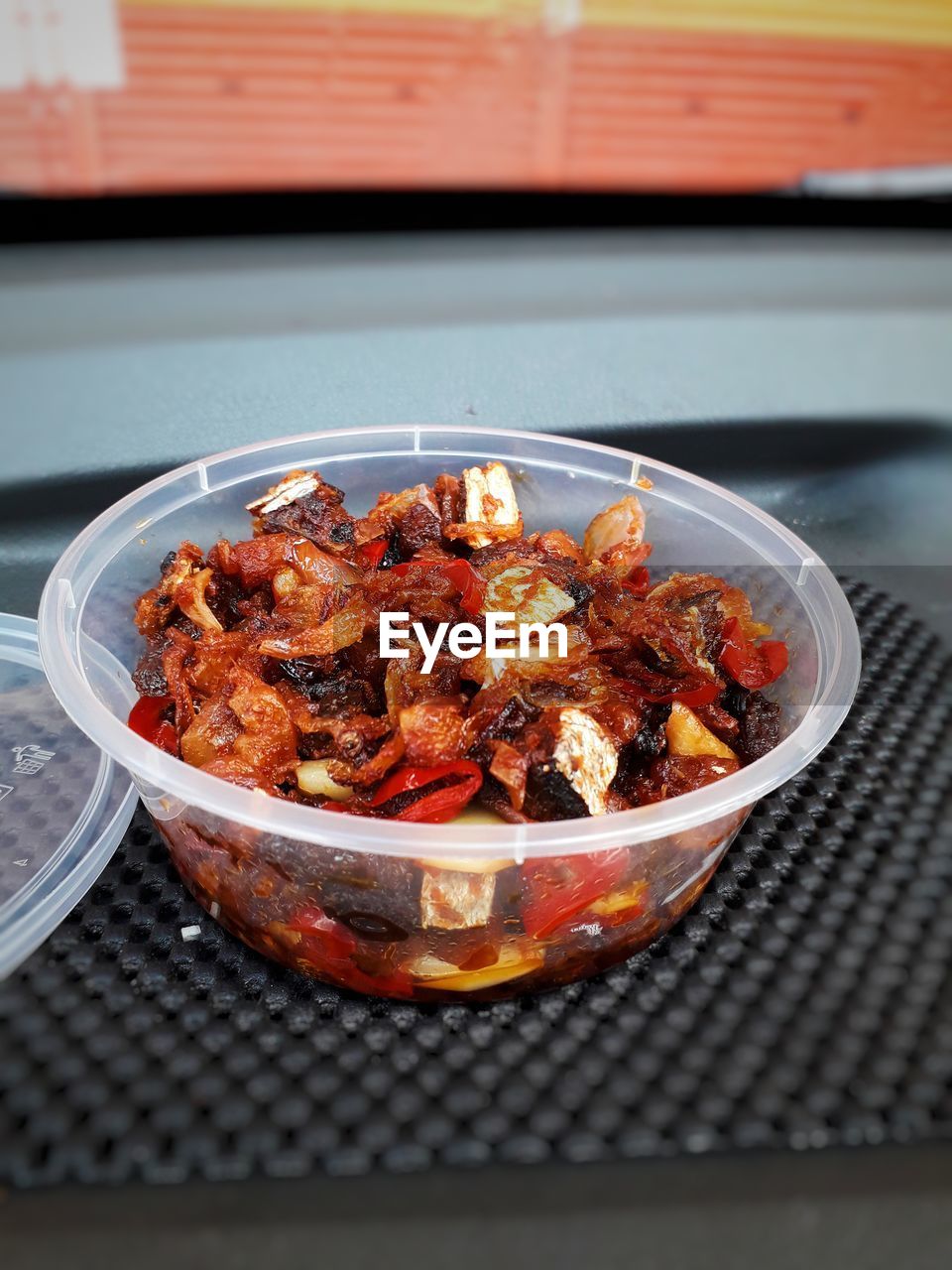 HIGH ANGLE VIEW OF MEAT IN CONTAINER ON TABLE