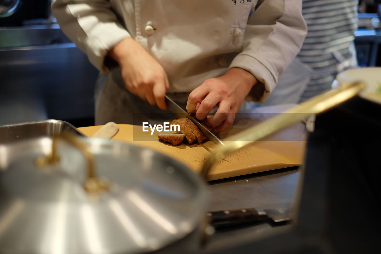 Close-up of chef in kitchen