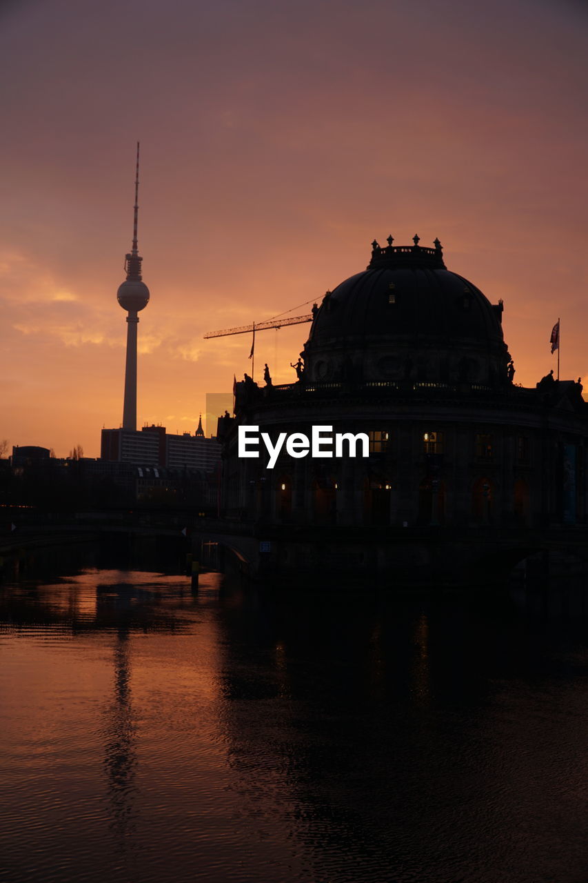 VIEW OF BUILDINGS AT SUNSET