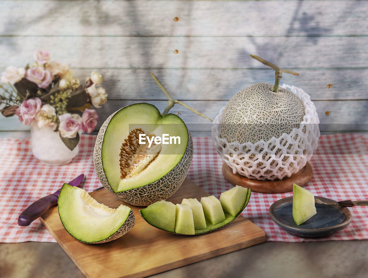 CLOSE-UP OF FRUITS ON TABLE