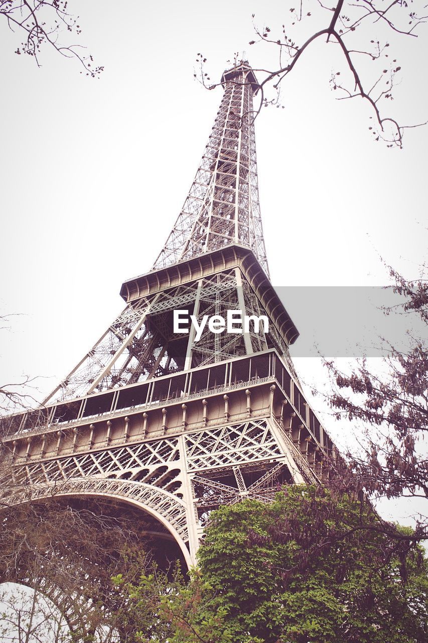 Low angle view of eiffel tower against clear sky