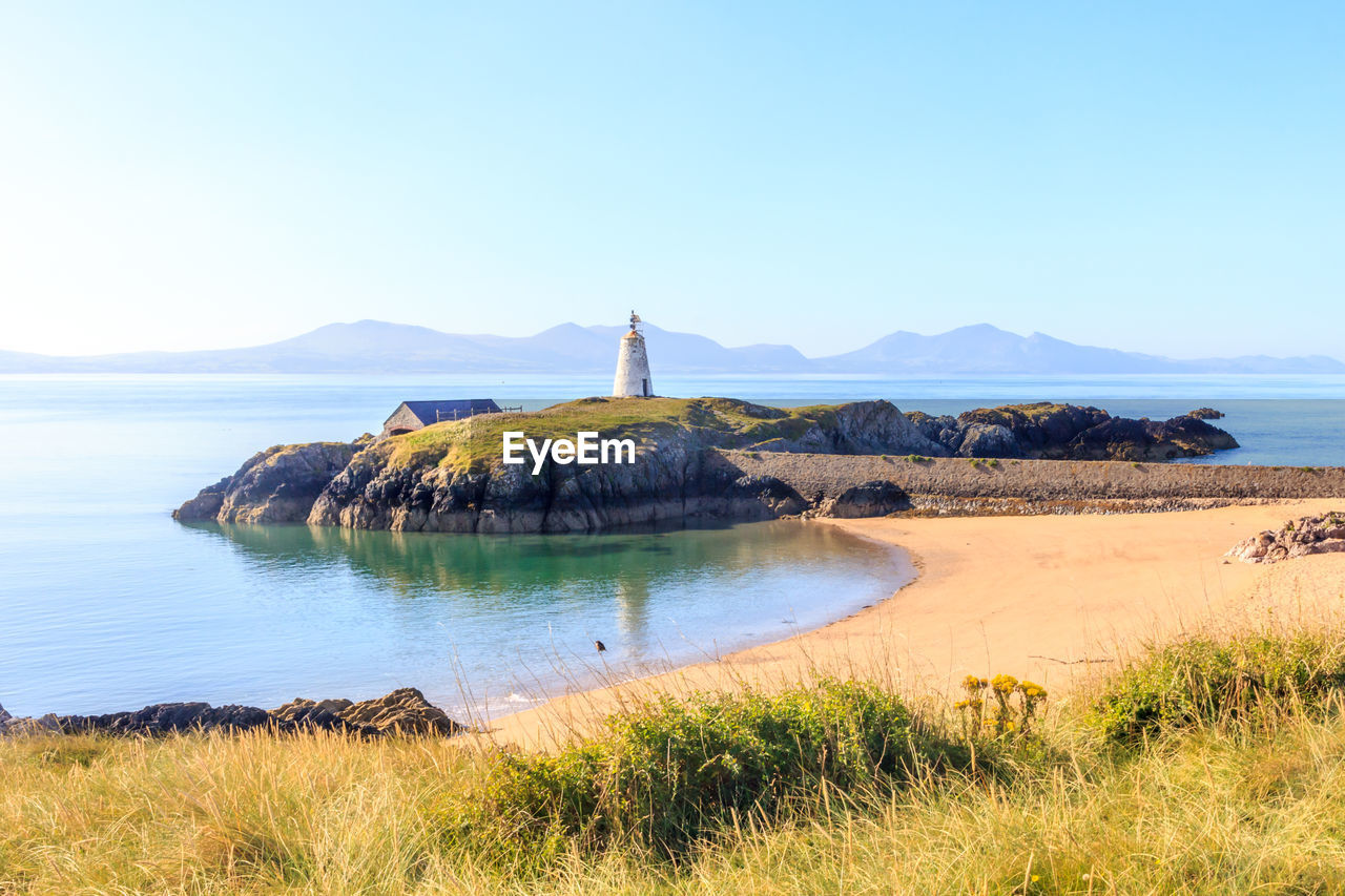 Scenic view of lake against clear sky