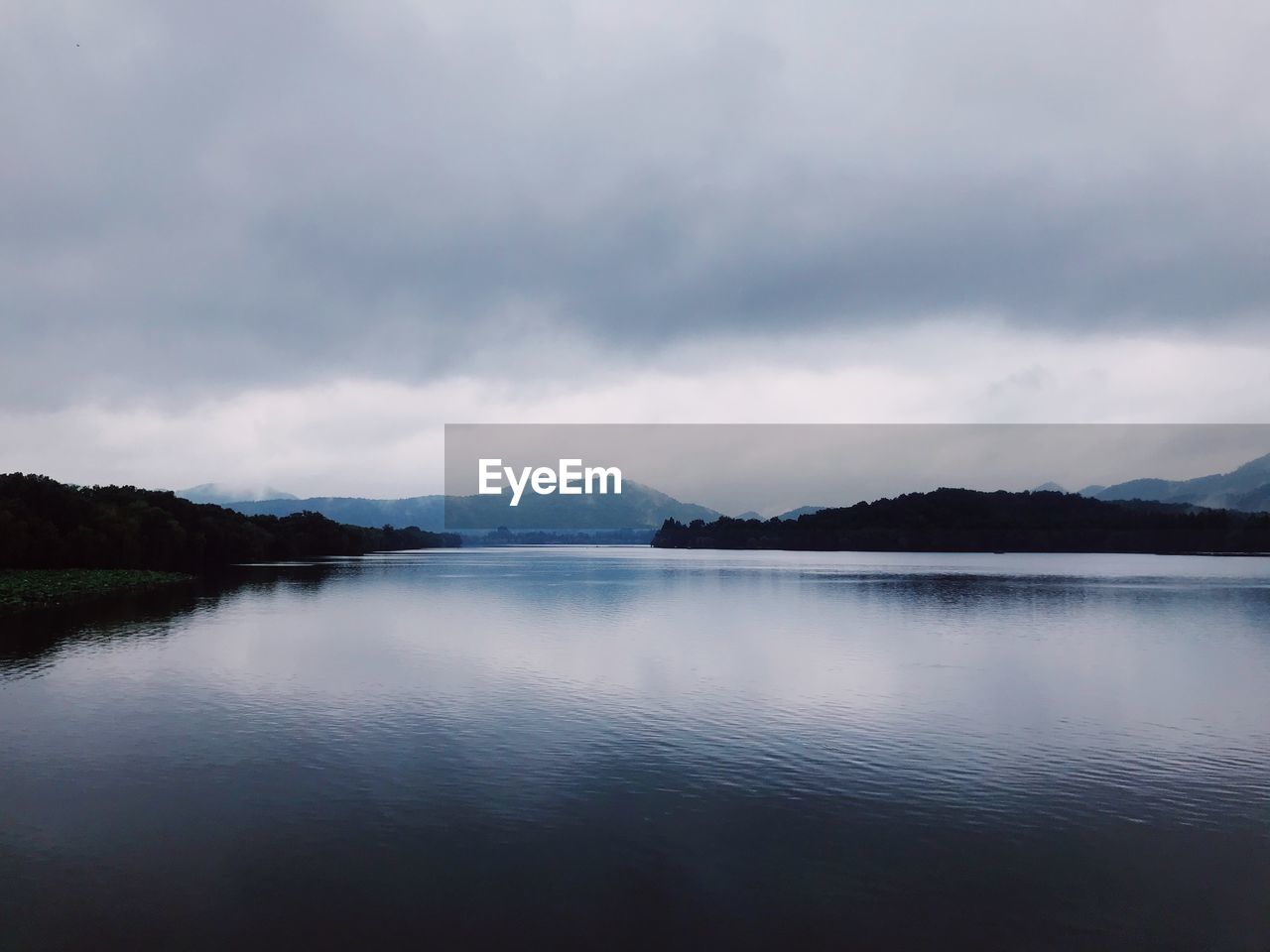 Scenic view of lake against sky