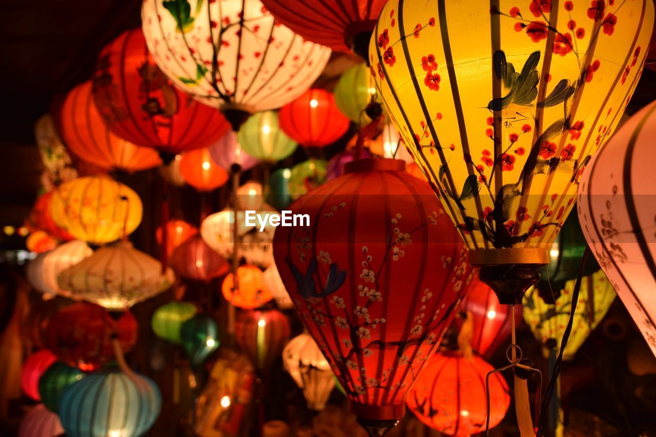 Illuminated lanterns hanging at night