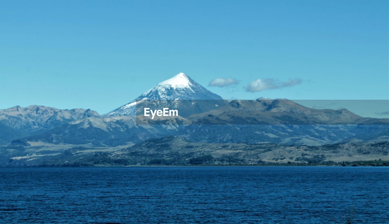 SCENIC VIEW OF SNOWCAPPED MOUNTAINS AGAINST CLEAR SKY
