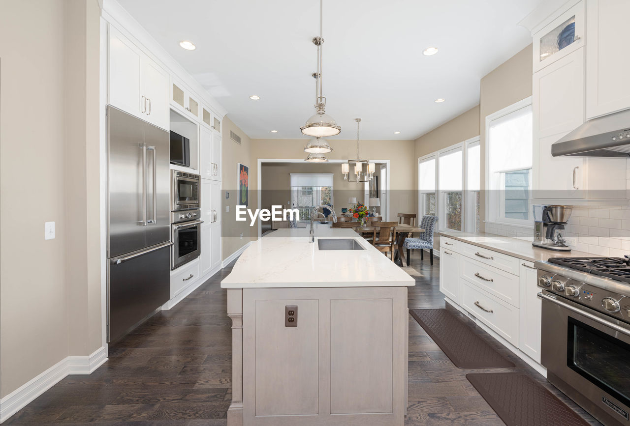 Kitchen renovation project has been remodeled with new cabinets and countertops