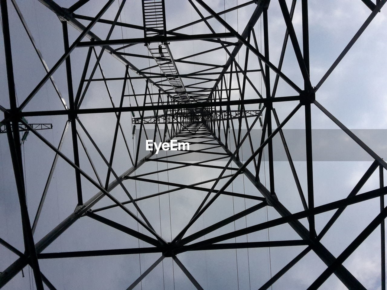 LOW ANGLE VIEW OF POWER LINES AGAINST SKY