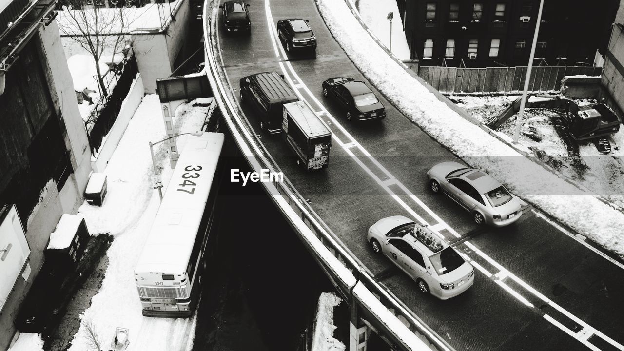 High angle view of vehicles on bridge during winter