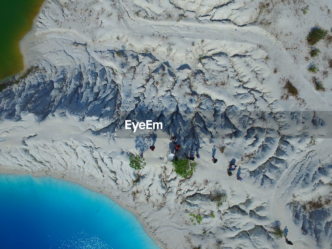 Aerial view of people walking at beach