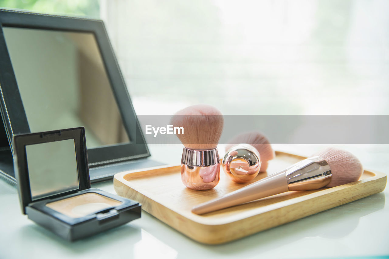 High angle view of beauty products on table