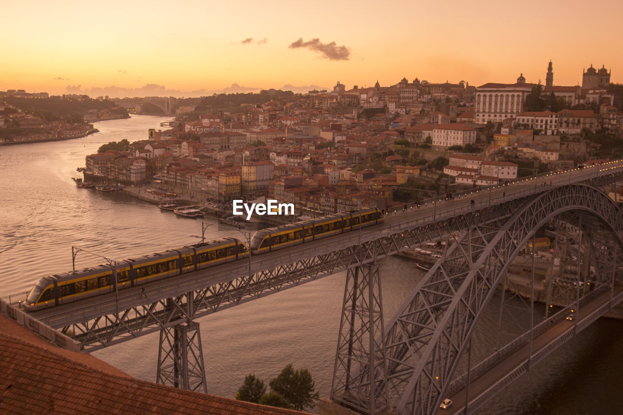 High angle view of train on dom luis i bridge over douro river in city