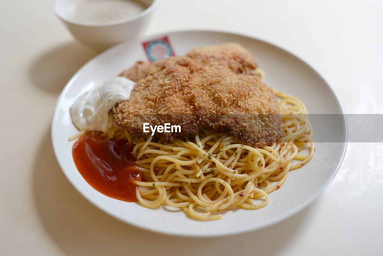 Close-up of food served on table