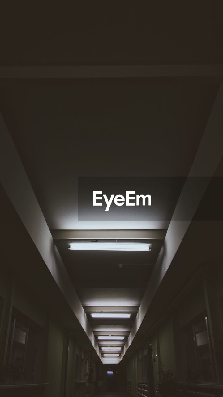 Low angle view of illuminated ceiling