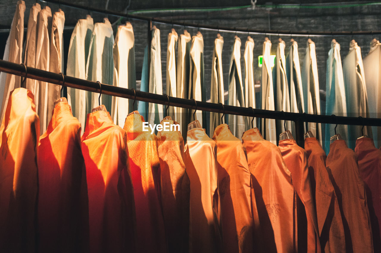 Close-up of clothes hanging at store