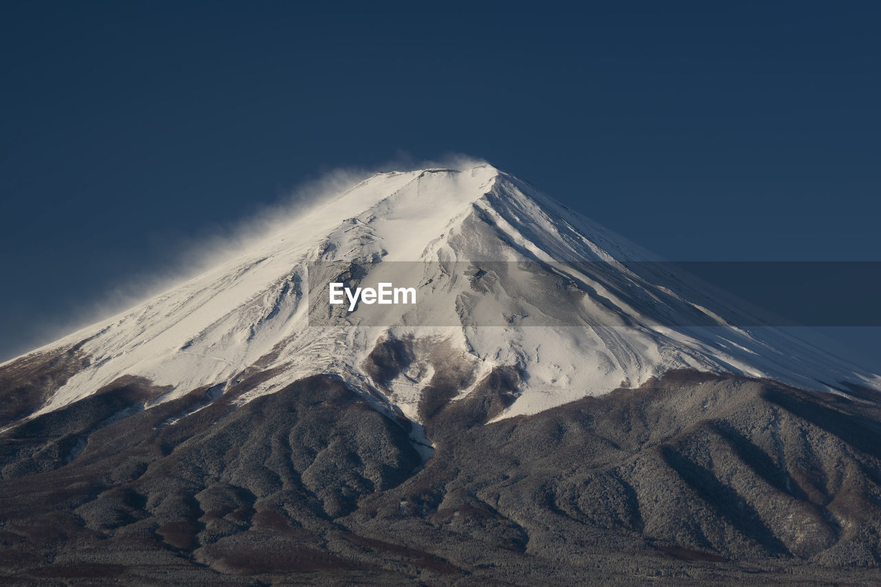 Snowcapped mountain against sky