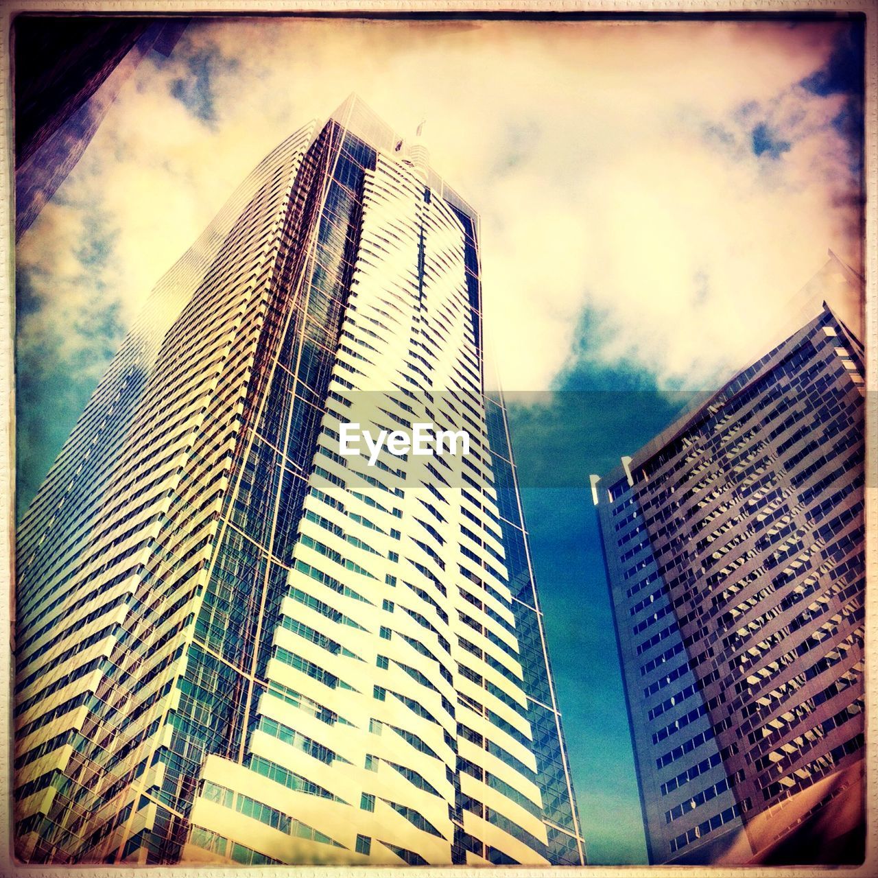 Low angle view of modern office buildings against sky